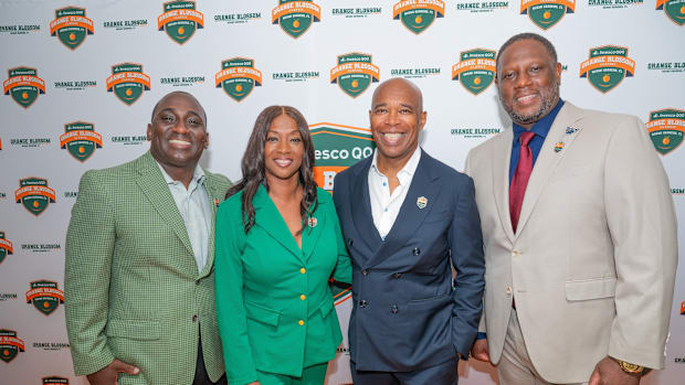 Orange Blossom Classic:  Coach James Colzie III (FAMU) with FAMU AD Angela Suggs; Howad AD Kery Davis and Coach Larry Scott (