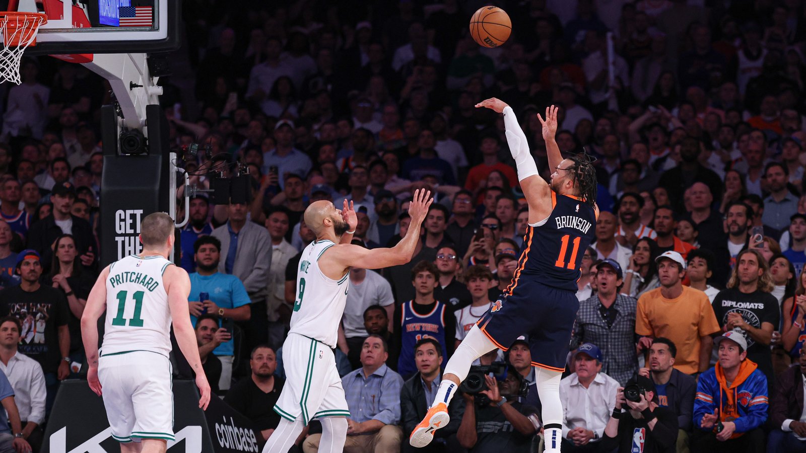 May 12, 2025; New York, New York, USA; New York Knicks guard Jalen Brunson (11) shoots the ball as Boston Celtics guard Jaylen Brown (7) defends in the second half during game four of the second round for the 2025 NBA Playoffs at Madison Square Garden.
