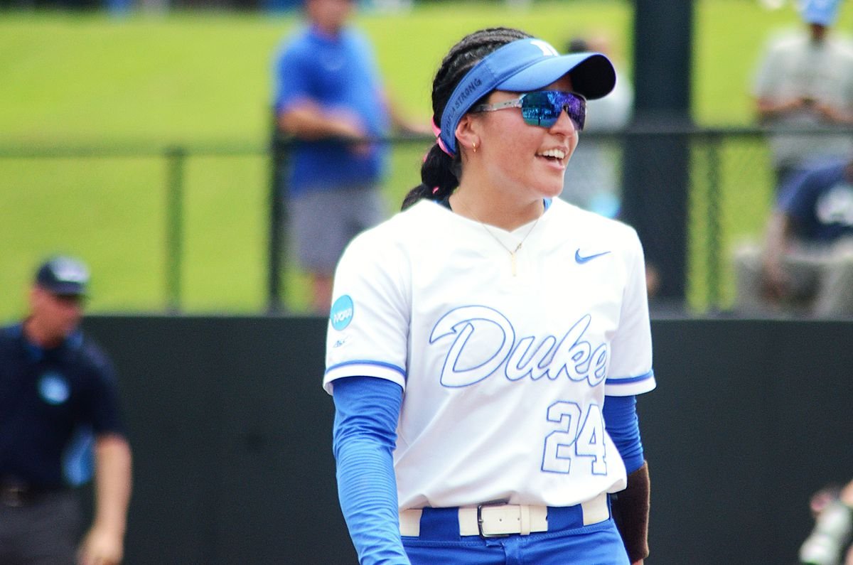 Duke infielder Thessa Malau’ulu smiles after a conversation with her pitcher during the regional round of the NCAA Softball Tournament against Howard on Friday, May 16, 2025, in Durham, North Carolina.