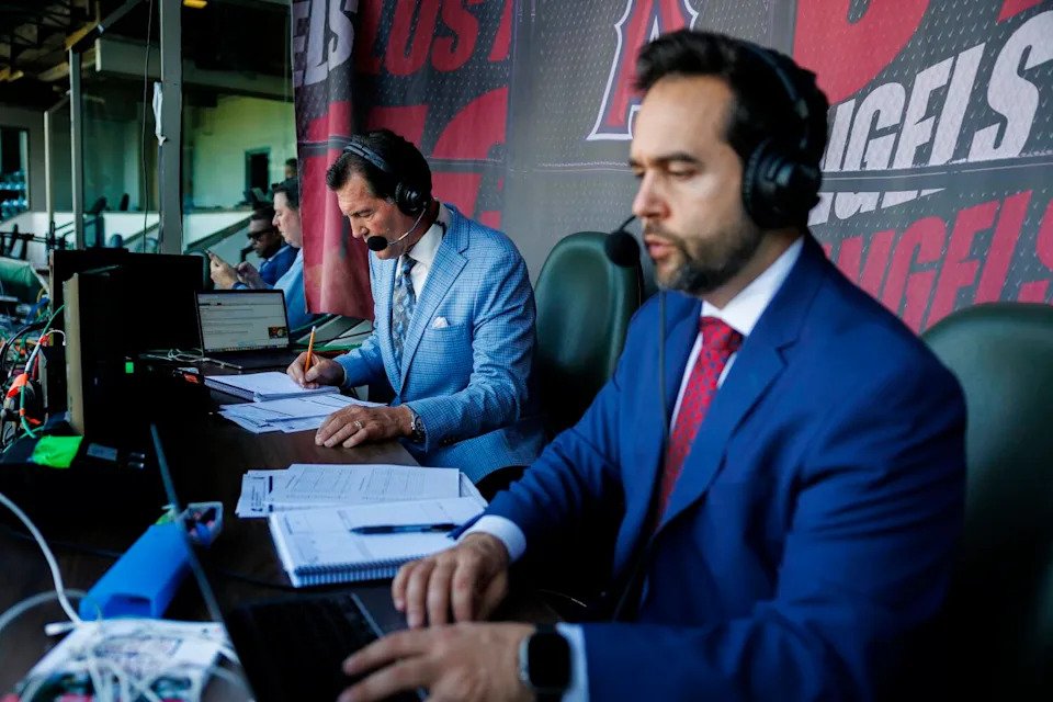 Angels broadcasters Mark Gubicza, left, and Wayne Randazzo prepare for a game against the Miami Marlins on May 24.