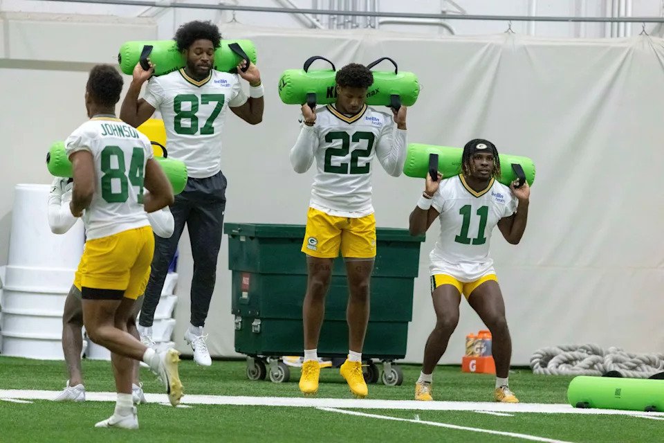Green Bay Packers wide receivers Romeo Doubs (87), Matthew Golden (22), and Jayden Reed (11) during an NFL football practice Wednesday, May 28, 2025, in Green Bay, Wis. (AP Photo/Mike Roemer)
