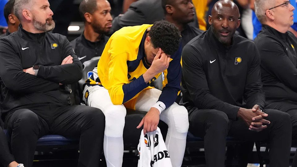 Indiana Pacers guard Tyrese Haliburton, center, reacts during the second half of Game 2 of the NBA Finals basketball series against the Oklahoma City Thunder Sunday, June 8, 2025, in Oklahoma City. (AP Photo/Julio Cortez)