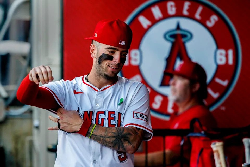 Angels shortstop Zach Neto walks through the dugout during a game against the Miami Marlins on May 24.