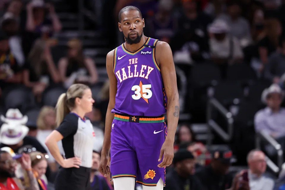 PHOENIX, ARIZONA - MARCH 30: Kevin Durant #35 of the Phoenix Suns looks on during the second half against the Houston Rockets at PHX Arena on March 30, 2025 in Phoenix, Arizona. The Rockets defeated the Suns 148-109. NOTE TO USER: User expressly acknowledges and agrees that, by downloading and or using this photograph, User is consenting to the terms and conditions of the Getty Images License Agreement. (Photo by Chris Coduto/Getty Images)