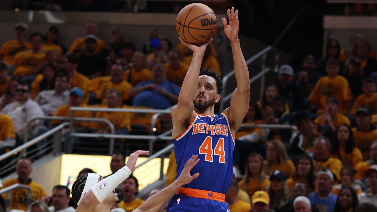 New York Knicks guard Landry Shamet (44) shoots a layup over Indiana Pacers guard Andrew Nembhard (2) during the second quarter of game three of the eastern conference finals for the 2025 NBA Playoffs at Gainbridge Fieldhouse
