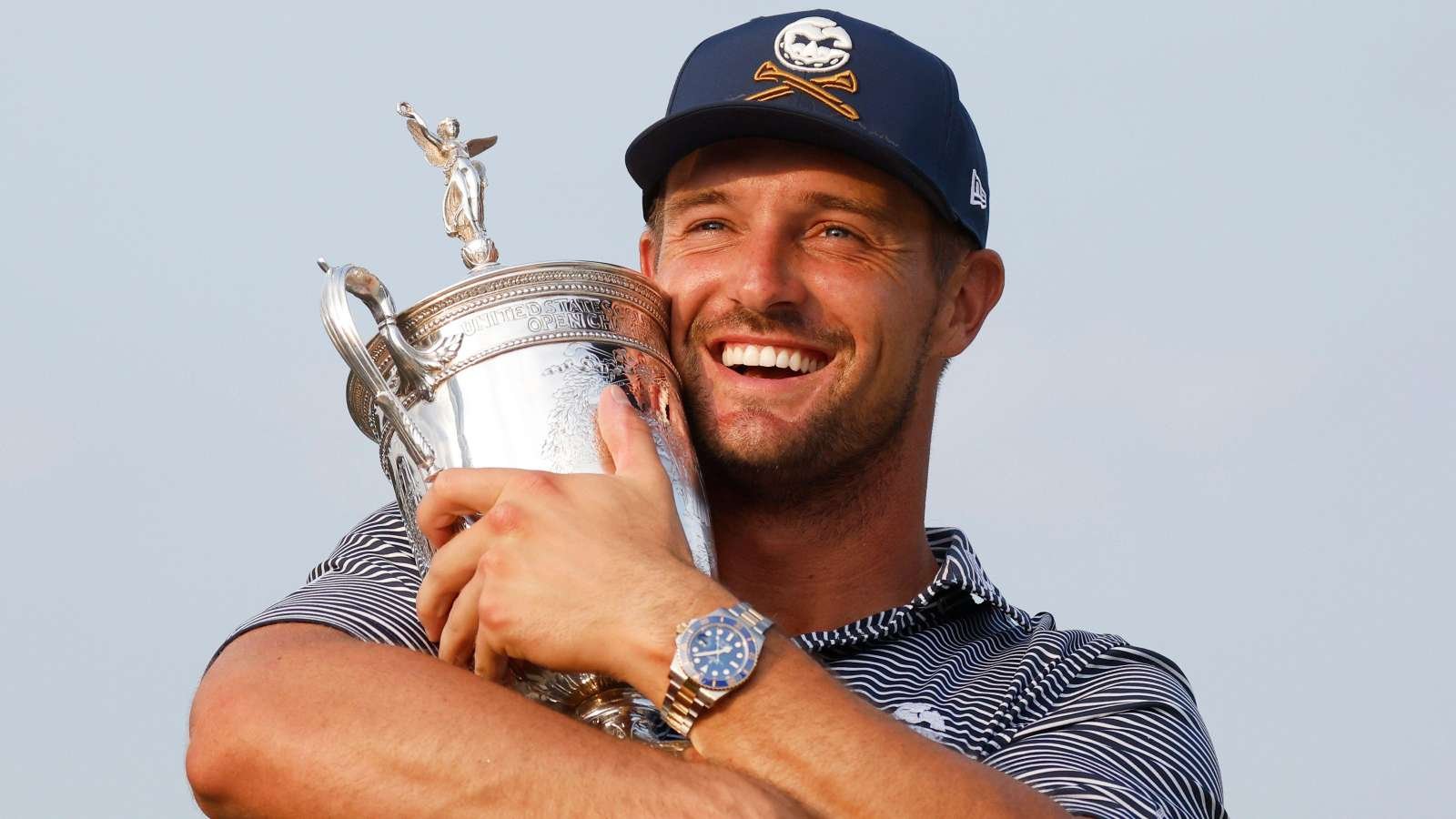 Bryson DeChambeau hugs US Open trophy