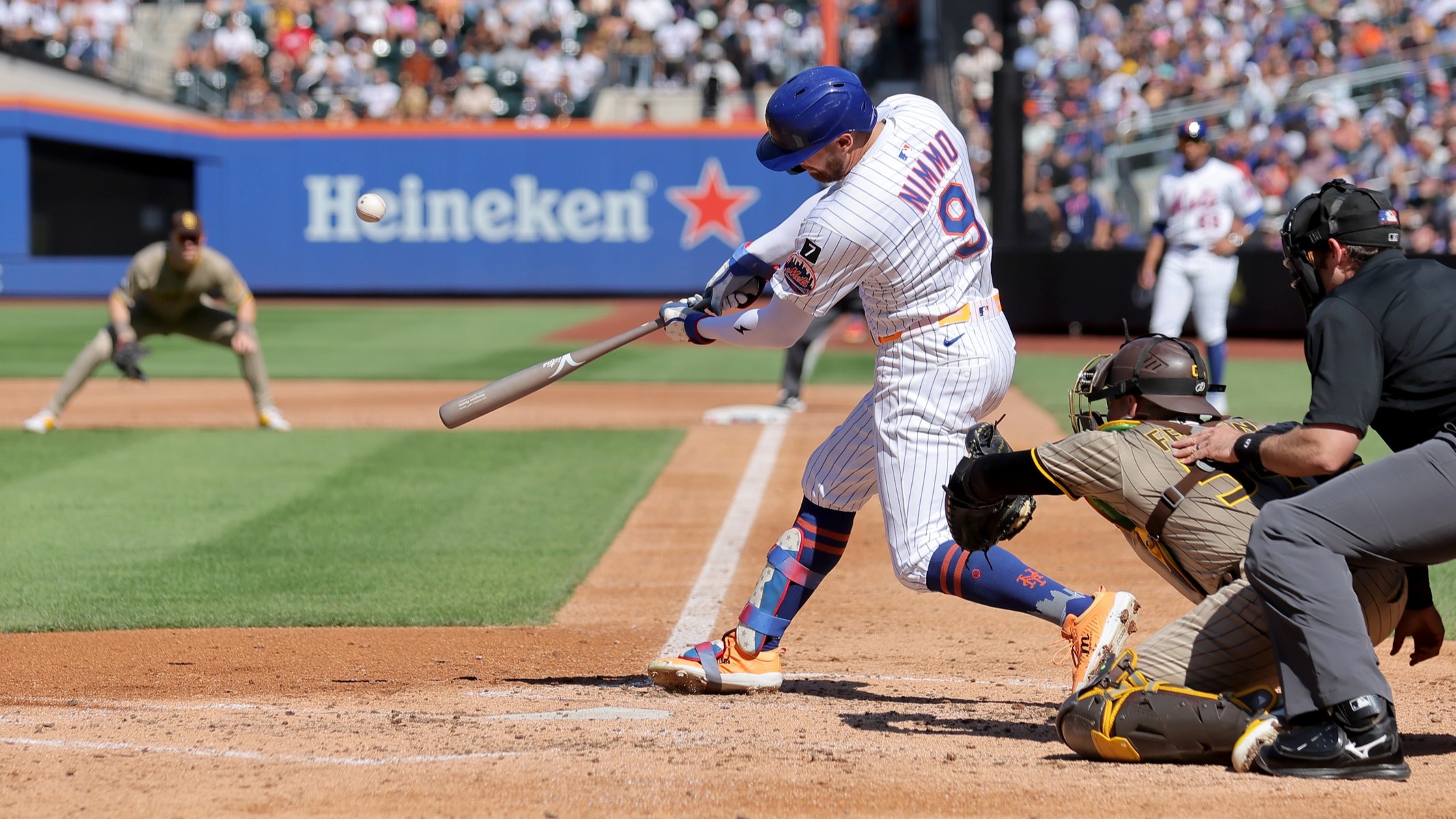 Sep 18, 2025; New York City, New York, USA; New York Mets left fielder Brandon Nimmo (9) hits a three run home run against the San Diego Padres during the third inning at Citi Field. 