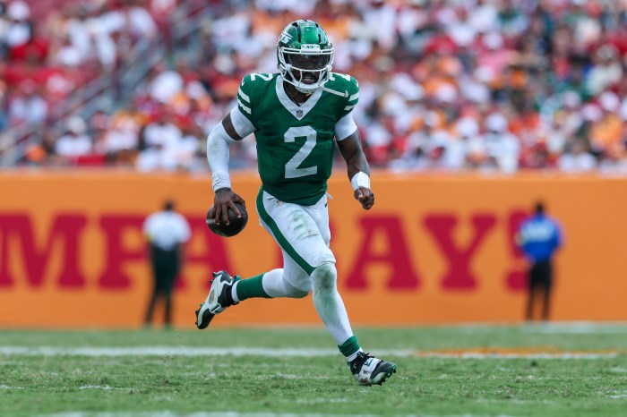 Tyrod Taylor runs with the ball