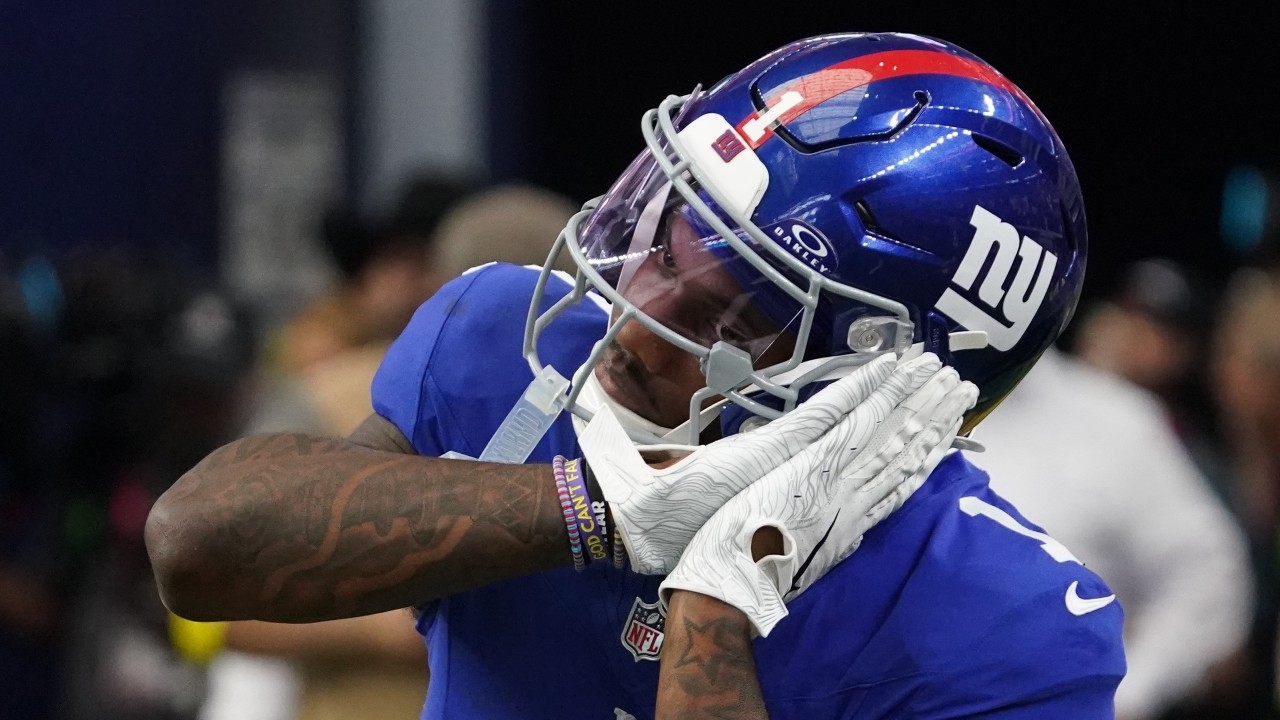 New York Giants wide receiver Malik Nabers (1) reacts after scoring a touchdown during the fourth quarter at AT&T Stadium. 
