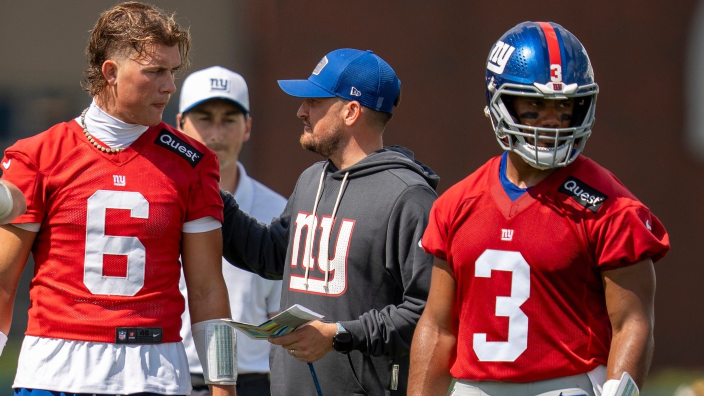 New York Giants quarterback Tommy DeVito (15), New York Giants quarterback Jaxson Dart (6), and New York Giants quarterback Russell Wilson (3) stand together during day one of the New York Giants training camp at Quest Diagnostics Giants Training Center in East Rutherford on Wednesday, July 23, 2025.