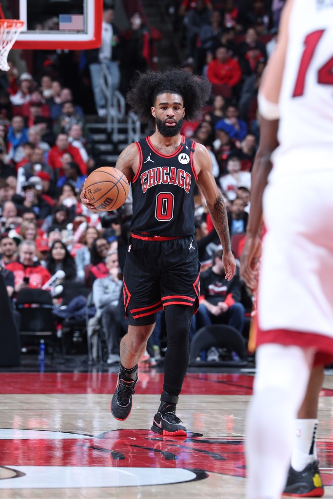 Coby White brings the ball up the court