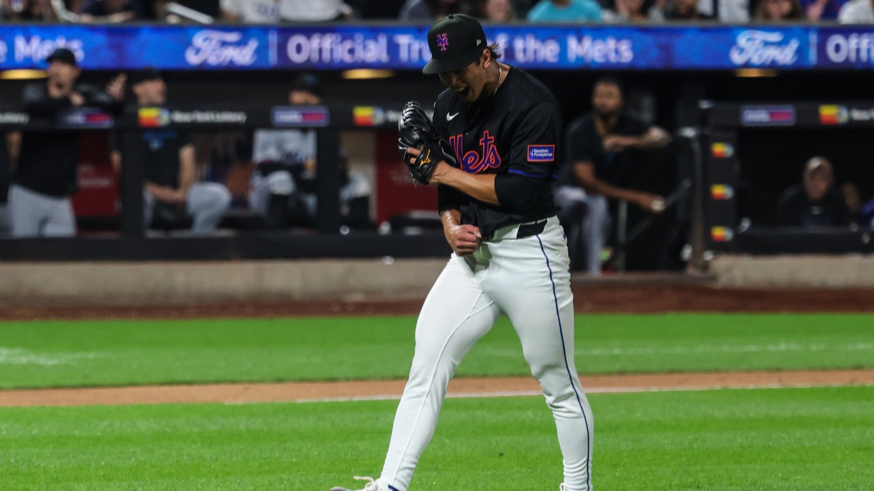 Aug 29, 2025; New York City, New York, USA; New York Mets starting pitcher Jonah Tong (21) reacts after striking out Miami Marlins catcher Liam Hicks (not pictured) to end the top of the fifth inning at Citi Field. 