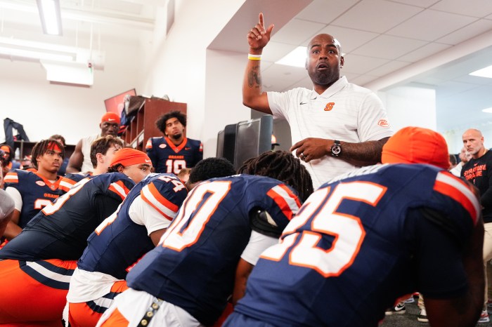 Syracuse head coach Fran Brown speaks to the team after a game against UConn at the JMA Wireless Dome on Sept. 6 in Syracuse, New York.